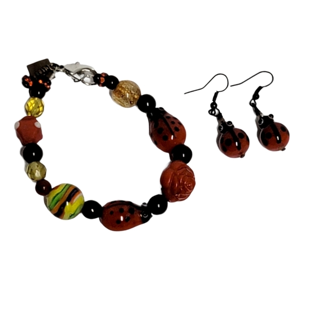 Set of ladybug glass bead bracelet and earrings